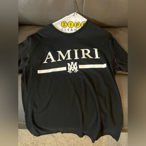 logo-print T-shirt from AMIRI featuring logo print, crew neck and short sleeves